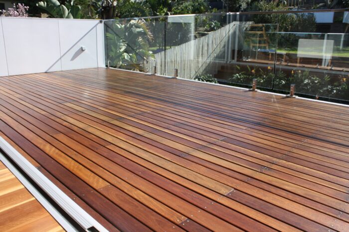 Outdoor timber viewing deck with glass fence